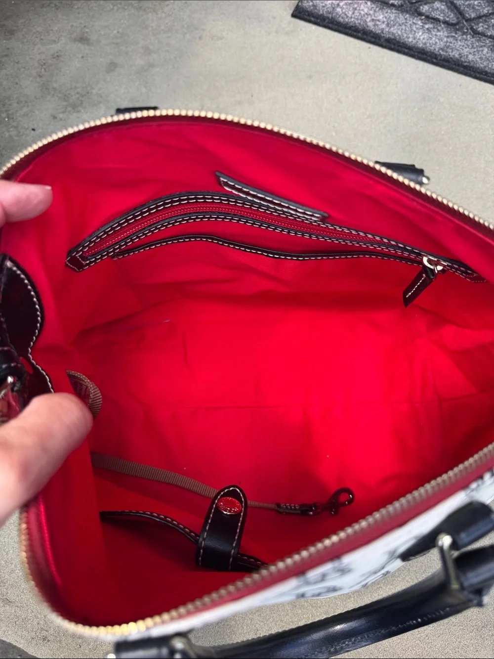 DOONEY AND BOURKE BLACK AND WHITE 1975 LOGO SATCHEL BAG
